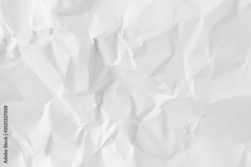 Fototapeta premium Abstract white crumpled paper texture background. Creased messy paper sheet with shadows and folds for creative minimalist design concept.