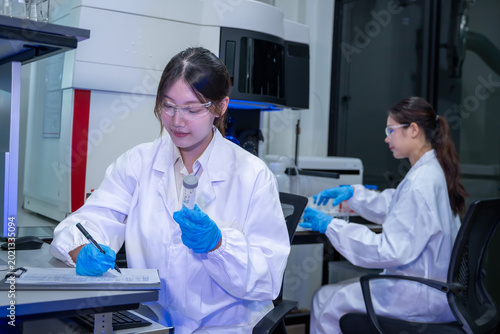 Scientific research in laboratory experimentation with equipment high-tech environment focused viewpoint