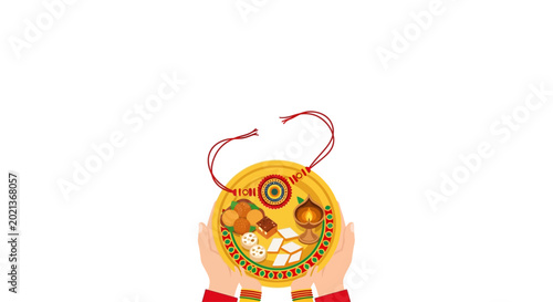 Hands holding a decorative plate with Rakhi and sweets for Raksha Bandhan.