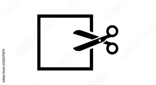 Photos Scissors cutting through a square paper.