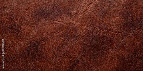 Foto Close-up shot of rich brown leather, showcasing texture, color, and detail for p