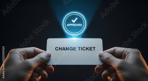 Hands holding a white card with the words CHANGE TICKET and an approved holographic badge above