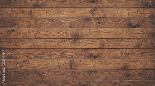 Foto A brown wooden plank wall background texture.