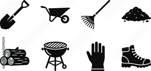 Foto Yard work and gardening tools, of shovel, wheelbarrow, rake, pile of dirt, logs,