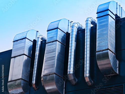 Industrial steel ventilation urban chimneys background