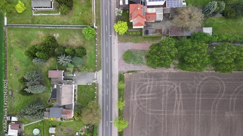 Aerial Top View of Rural Residential Area Along Country Road