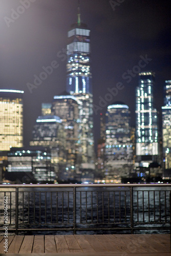 City Lights Glow. Urban Night View With Glowing Reflections And Lively City Ambiance new york