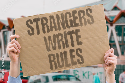 Konstfotografi "Strangers Write Rules" Strangers in office write laws dictating what individuals may do with their bodies