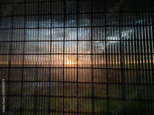 Golden Prison at Sunset – Cinematic Light and Shadow.