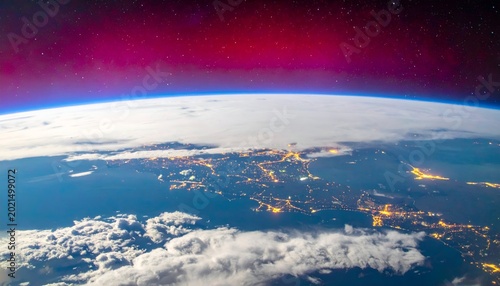 Earth from space with city lights, clouds, and a red starry atmosphere
