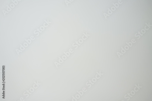 Foto Grauer Hintergrund mit heller Anmutung und weichem Verlauf
