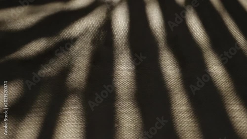 Luxury black leather texture and shiny satin fabric background with smooth purple and gold velvet drapery pattern