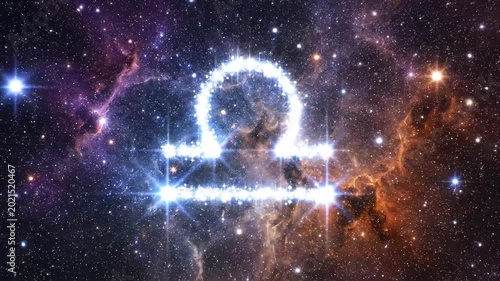 A bright spiral galaxy glows with brilliant blue light amidst dark outer space dust and distant stars in the deep cosmic universe