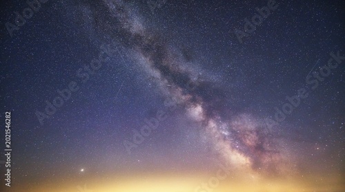 Milky Way in the cloudless starry sky, shooting stars