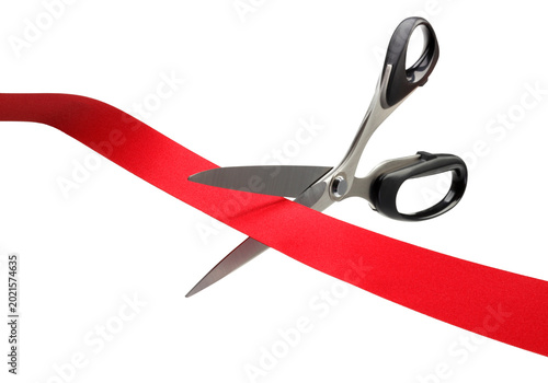 Scissors cutting red ribbon for grand opening ceremony, inauguration event isolated on transparent background PNG