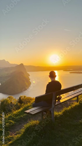 POV Reveal Shot from Hiking Boots to Person Sitting on Bench with Sunset View Over Lake Lucerne, Märibänkli, Rigi, Switzerland