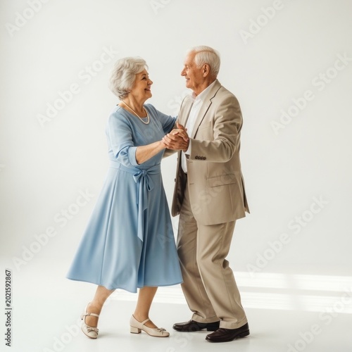 Elderly couple dancing joyfully