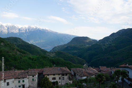 sea, cloud uns moutains, village, house