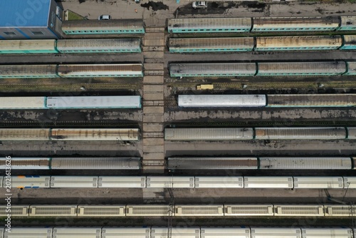 Aerial View of Freight Trains Stationed on Parallel Tracks at Railway Yard