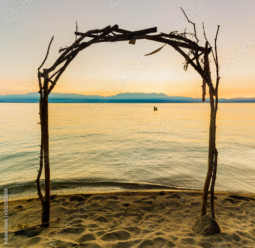 Sunset on Wedding Arch on Sandy Beach at Lake Tahoe at Zephyr Cove, Nevada, USA