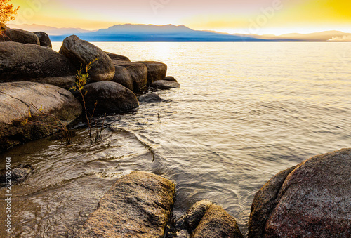 Sunset on Rocky Shoreline on Lake Tahoe at Zephyr Cove, Nevada, USA