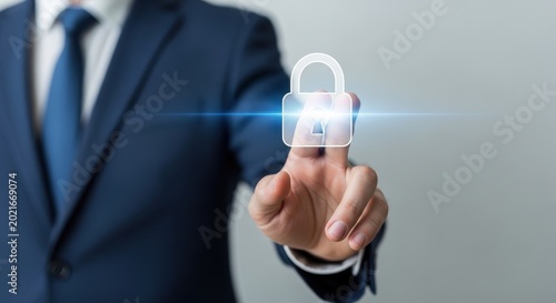 Businessman touching a glowing digital padlock icon, signifying data security and network protection in technology.