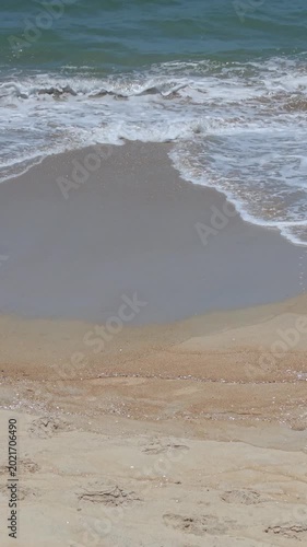 Summer seascape beautiful waves, blue sea water in sunny day. Royalty high-quality free best stock of tranquil beach with turquoise waves splashing, sand shore. Aerial view, tropical nature background