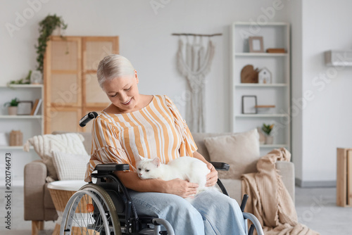 Mature woman in wheelchair ...