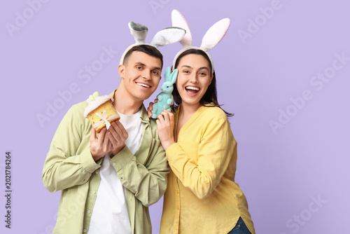 Happy young couple with Eas...