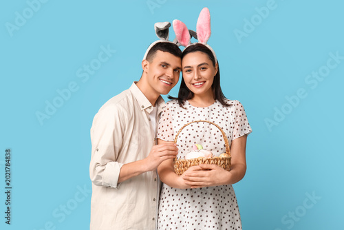 Happy young couple with Eas...