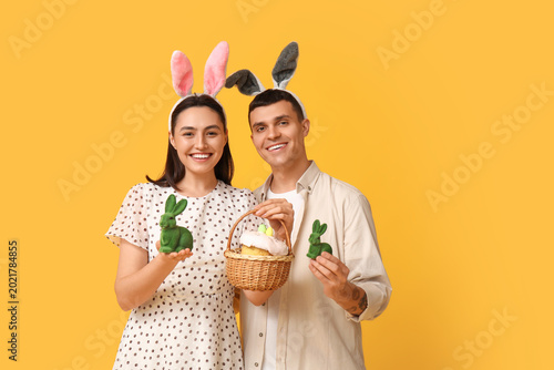 Happy young couple with Eas...