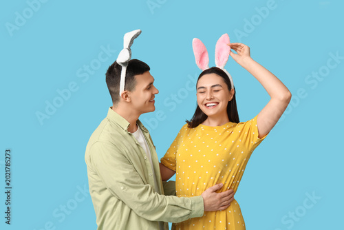 Happy young couple with Eas...