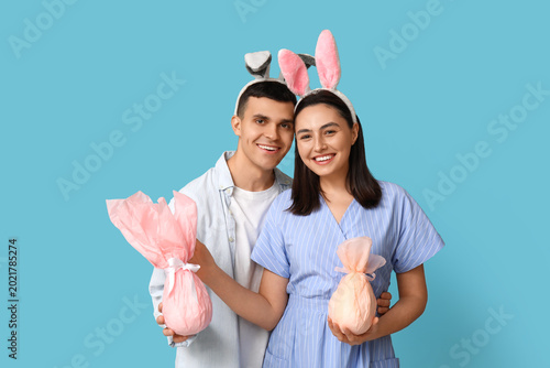 Happy young couple with Eas...