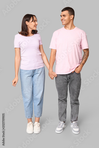 Happy young couple holding ...