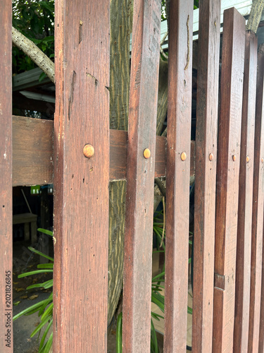 old wooden fence with metal texture and metal fence.
