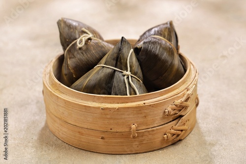 Bakcang, zongzi, bakchang. Chinese savoury sticky rice dumplings in bamboo leaves wrapping