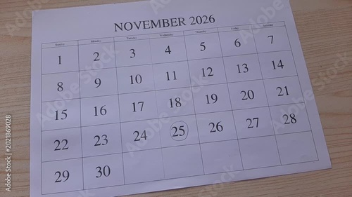 Marking the 25 November 2026 date on the calendar	