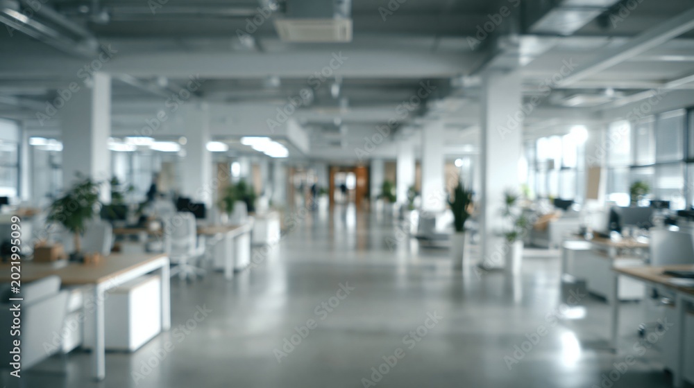 Fototapeta premium Modern, bright, and spacious open-plan office interior with desks, chairs, and natural light