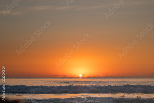 Orange sky at sunrise in Cancun
