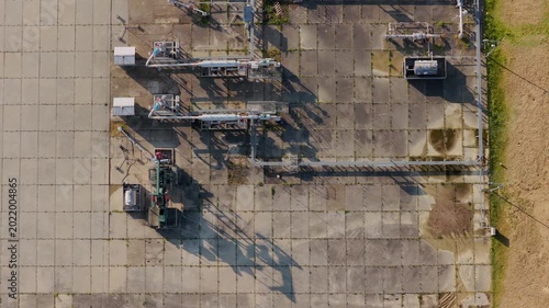 Aerial view of UGS Damborice industrial facility with complex piping and machinery on concrete pads in Damborice, South Moravian Region, Czechia.