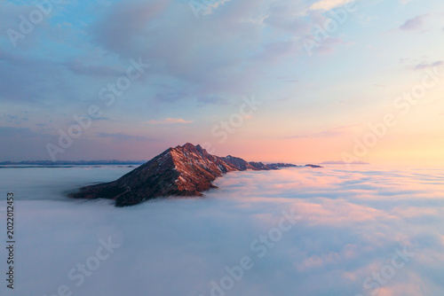 Sakhalin Island, Zhdanko Ridge, aka the Sleeping Dragon, above a sea of ​​clouds at dawn