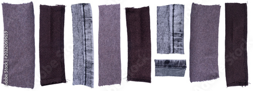 Isolated collection of diffirent scraps of fabric with copyspace on white background