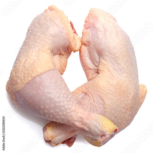 Raw chicken legs on white background.