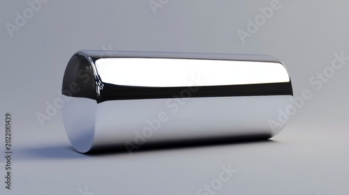 Polished chrome cylinder on neutral background.