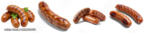 Foto Assortment of grilled sausages with grill marks and parsley, isolated on transpa