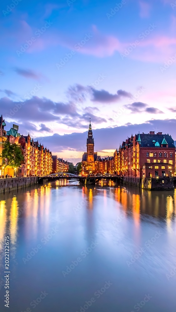 Fototapeta premium Canal with buildings and church tower.