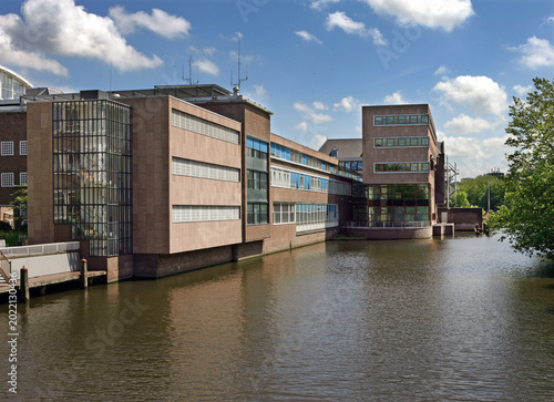 Bild auf Leinwand Police office at a canal in Amsterdam Netherlands