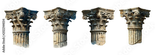 Fotografi Four ruined ancient roman or greek corinthian column capitals showing classic ar