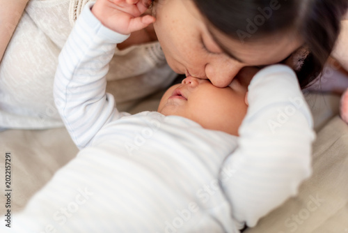 Fotografie Tender moment between mother and baby.