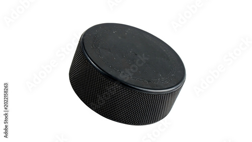 Photography A standard solid black vulcanized rubber ice hockey puck sports game training eq